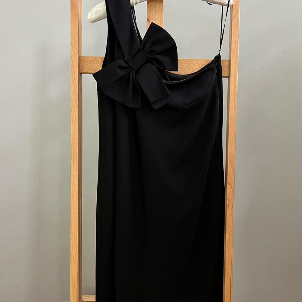 Black, one-shoulder dress.